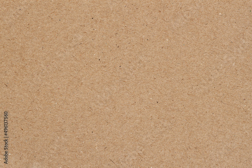 Brown recycled paper background, texture close-up. Recyclable material