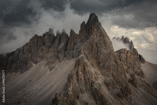 Paternkofel mountains in the Dolomite Alps in South Tyrol during summer with dark clouds in sky, Italy.