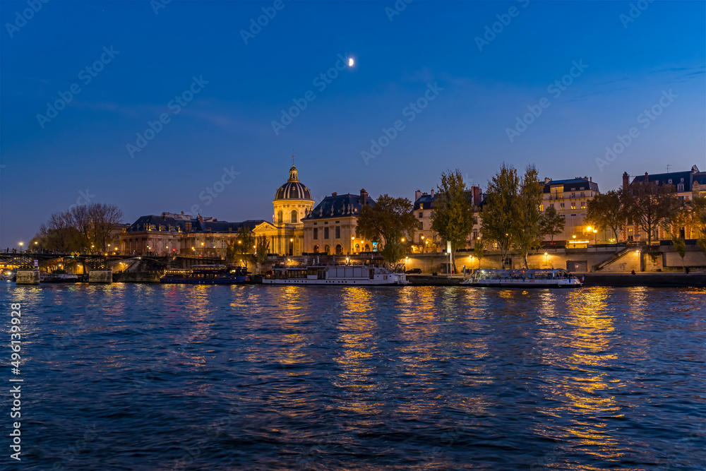 Parisian Architecture View From the Seine Docks at Blue Hour Moonrise Lights and Reflections
