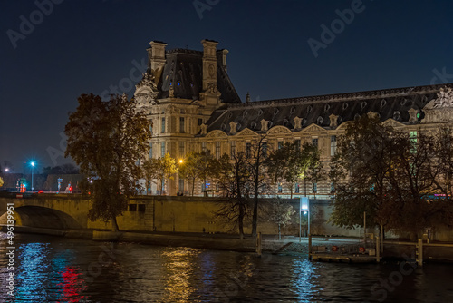 Famous Monuments in Paris at Night Traffic Seine River and Docks