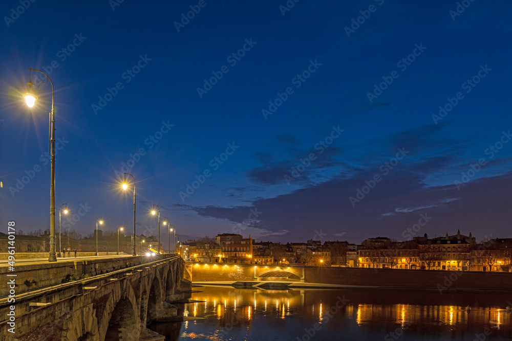 Dawn Over Toulouse Center and New Bridge With Stone Buildings and Garonne River