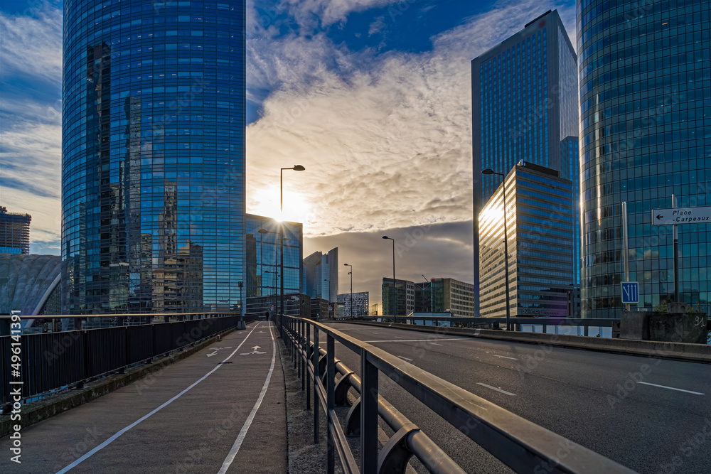 Sun and Shadows at La Defense Business District Traffic Buildings Clouds