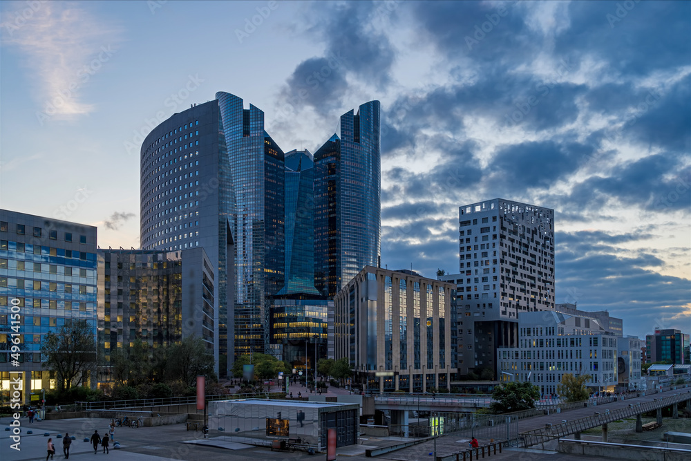 Obraz premium Some of the Towers and Hotel at La Defense Business District at Day With Clouds Pedestrians