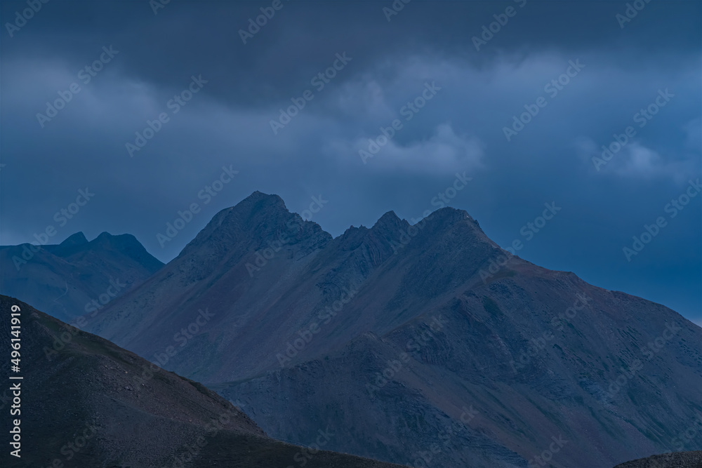 Cloudy End of Day Over the French Alps Mountains Dark Scenery