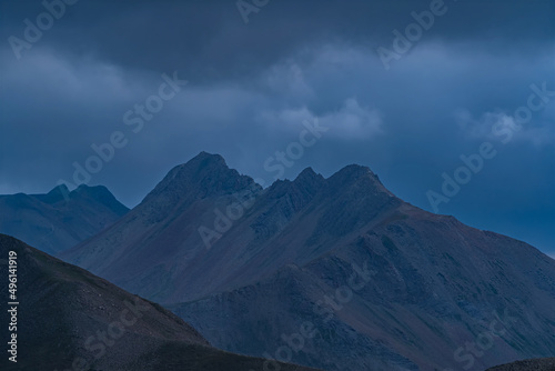 Cloudy End of Day Over the French Alps Mountains Dark Scenery