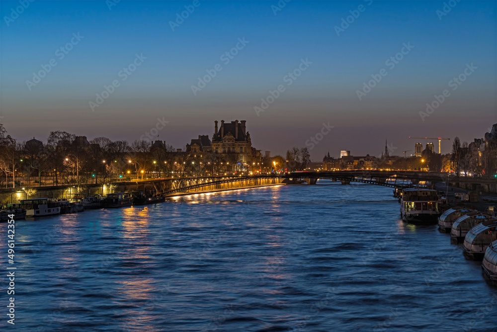 Seine River With Boats in Paris and Famous Monuments at Dawn Sunrise