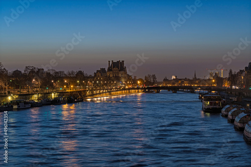 Seine River With Boats in Paris and Famous Monuments at Dawn Sunrise