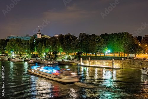 Seine River and Boats Cruises in Paris at Night With Docks and Trees © Loic Timelapse