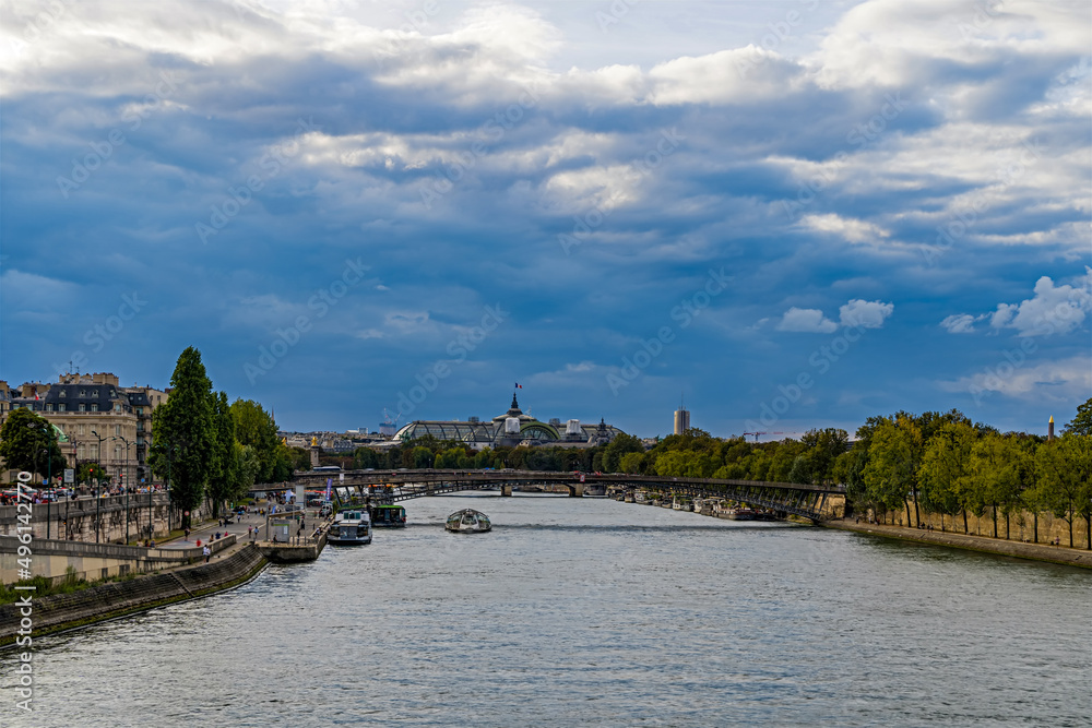 Stormy Sky Over Paris Seine River and Boats Bridges Monuments