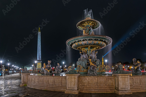 Historic Fountain at Concorde Place and Eiffel Tower in Paris at Night