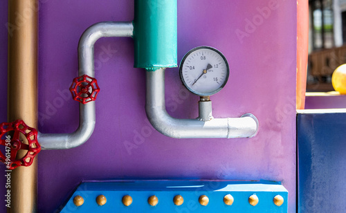 Close up of manometer on the hydraulic equipment photo