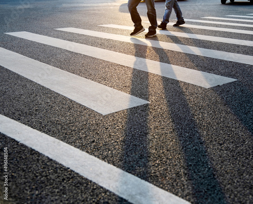 Men walking on the crosswalk
