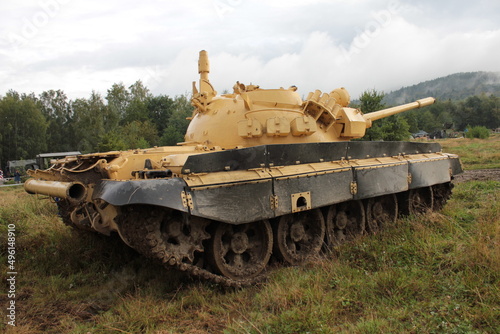 A historic tank standing in the field before the shows