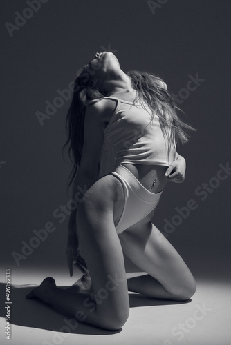 Beautiful body of young fitness woman