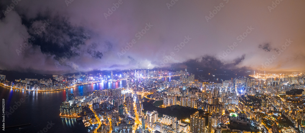 Aerial view of the Victoria Harbour, Hong Kong, night time. famous travel destination.