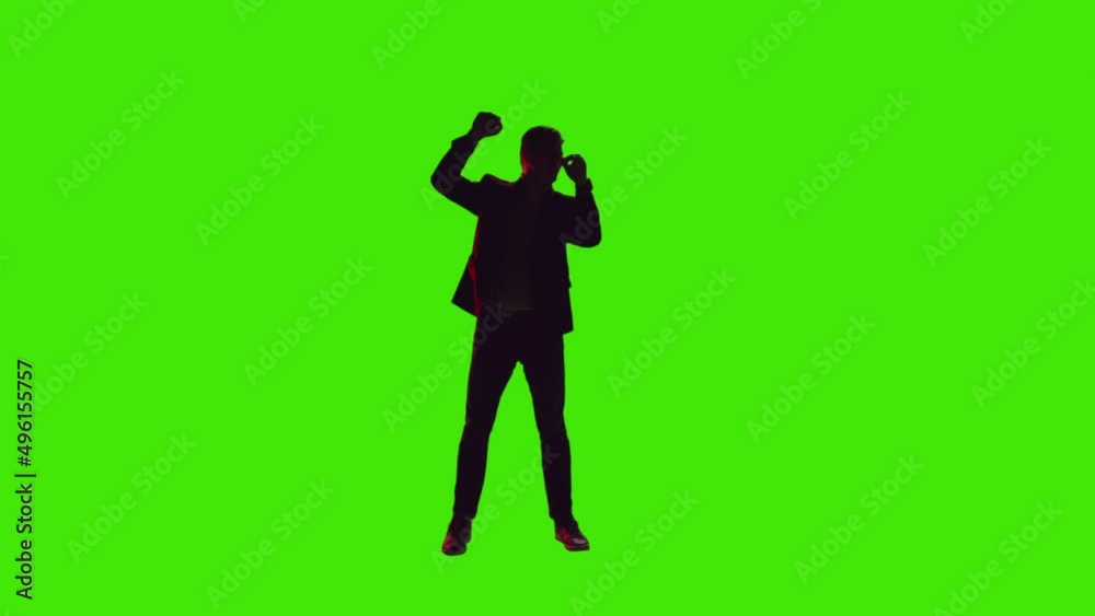 A young man is dancing so hard with loud music on greenscreen A young man is dancing so hard with loud music on greenscreen