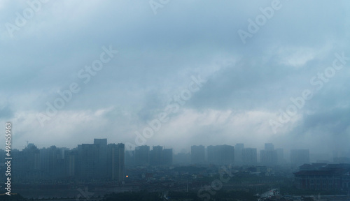 Modern buildings on stormy day © xy