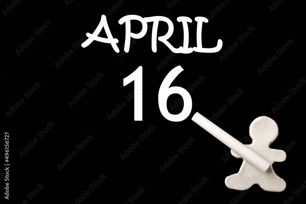 A small white plasticine man writing the date 16 April on a black board. Business concept. Education concept. A small white plasticine man writing the date 16 April on a black board. Business concept. Education concept.
