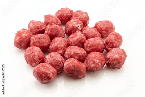 Raw meatballs isolated on white background. High angle and copy space