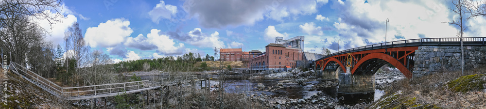 Swedish hydropower plants where the river is also used for salmon fishing, newly renovated bridge preserved with original colors and the old technology preserved, Carl XIII's bridge from 1816