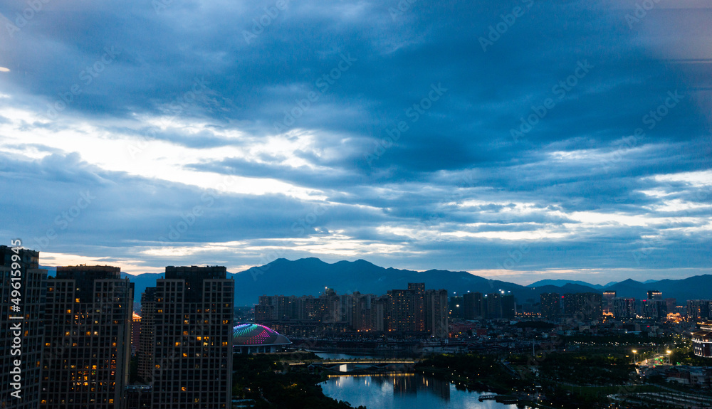 Fototapeta premium Dark blue cloud over the city
