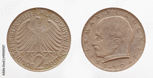 Germany - circa 1961: a 2 DM coin of Germany showing the federal eagle of the Federal Republic of Germany and Deutsche Mark with the portrait of the founder of quantum physics Max Planck photo
