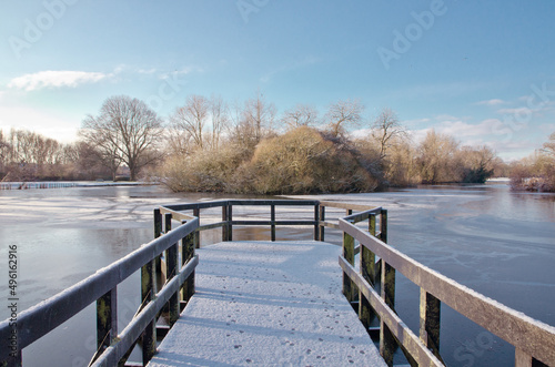 wooden bridge in the wintery park © michael