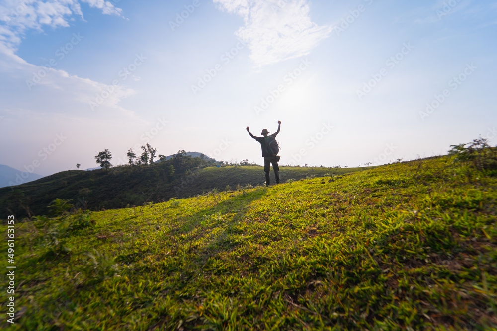solo backpacker man happy and joyful after success climb the mountain solo backpacker man happy and joyful after success climb the mountain