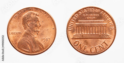 USA - circa 1987: a USA one cent coin showing the portrait of President Abraham Lincoln and the Lincoln Memorial building. Text: In god we trust