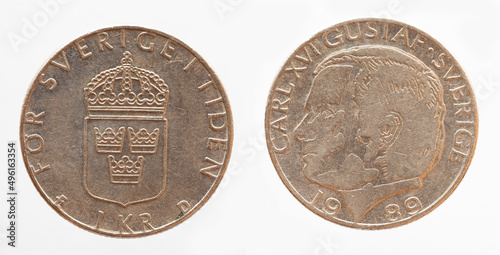 Sweden - circa 1989: 1 Kroner coin of Sweden showing a portrait of King Carl XVI. Gustaf of Sweden and the coat of arms with crown photo