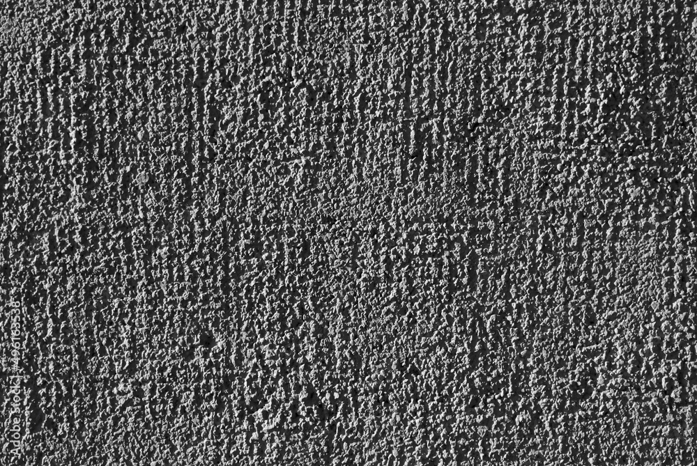 Fototapeta premium gray background. in the photo, gray decorative plaster on the wall.