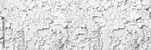 White weathered concrete wall wide panoramic texture. Old cracked peeling paint light surface banner backdrop. Abstract grunge vintage whitewashed background