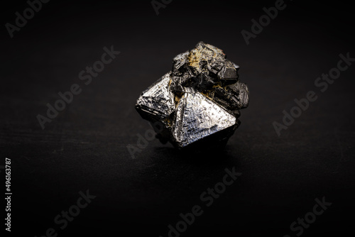magnetite stone, magnetic material formed by iron oxide, magnet stone used in compasses photo