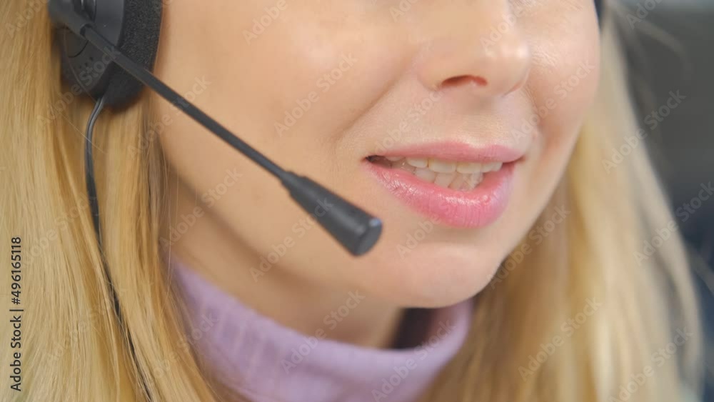 Call center operator talking to client. IT specialist in headset speaking with customer. Friendly online support staff speaks in microphone Call center operator talking to client. IT specialist in headset speaking with customer. Friendly online support staff speaks in microphone