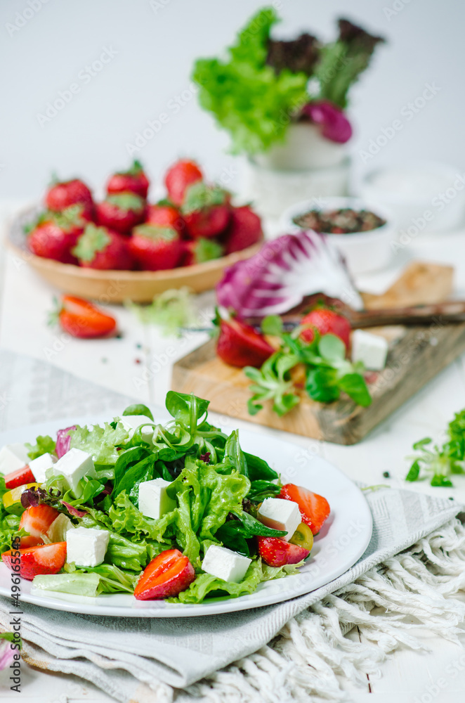Fresh salad with feta cheese and strawberry Fresh salad with feta cheese and strawberry