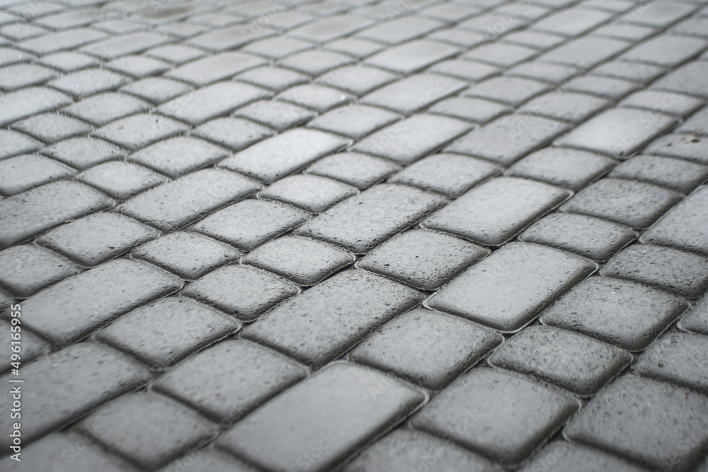 wet gray cobblestone background texture 