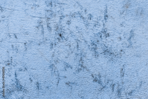 Old concrete wall worn cement background with abstract paint blue rough texture