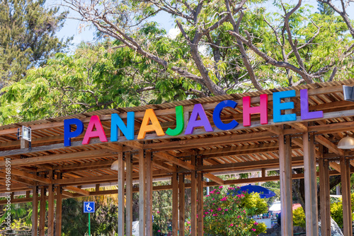 panajachel city sign on the beach front of lake atitlan, guatemala photo