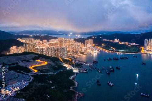 Epic Aerial view of Victoria Harbour, focus on the East side of Hong Kong Island © gormakuma