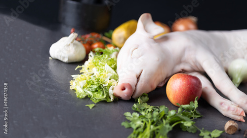 Preparación cochinillo crudo photo