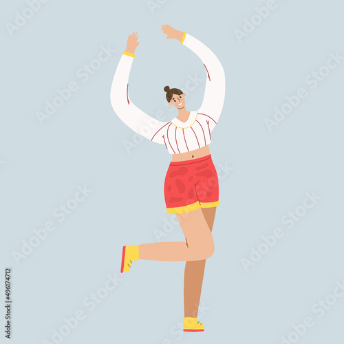 The woman is dancing. Feminism concept. The girl holds her hands above her