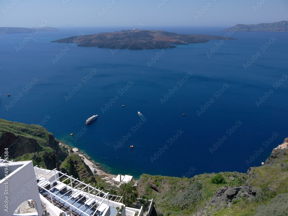 White buildings on the cliff and blue aegean seascape at santorini island
