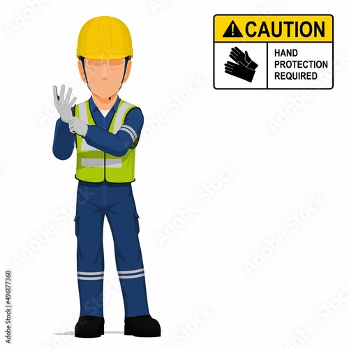 An industrial worker is putting on the gloves on white background