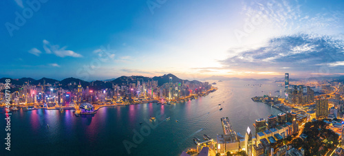 Aerial view of the Victoria Harbour, Hong Kong, at Twilight time. famous travel destination.