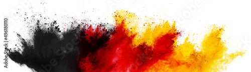 Fotografiet colorful german flag black red gold yellow color holi paint powder explosion isolated white background