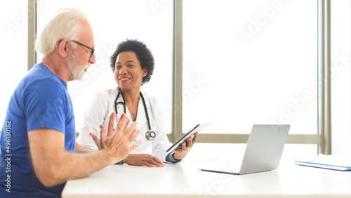 consultation between doctor and patient for treatment