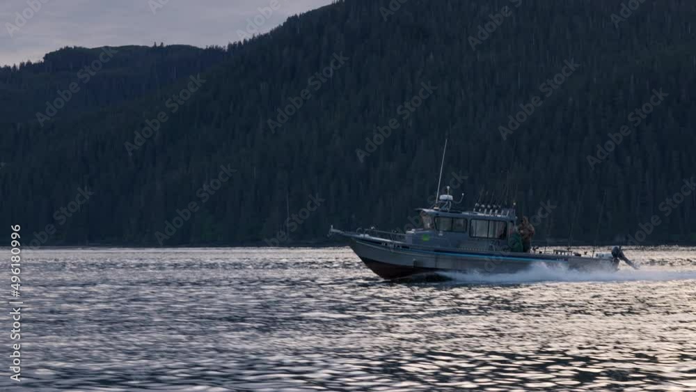 Fishing boat traveling in slow motion Fishing boat traveling in slow motion