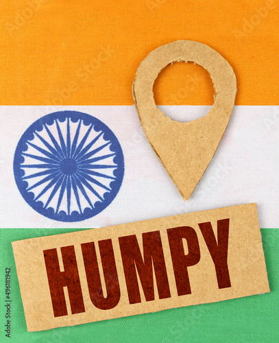 On the Indian flag, a geolocation symbol and a sign with the inscription - Humpy photo
