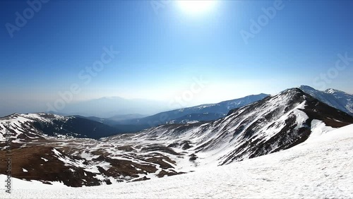 Scenic view on snow capped mountain peaks of the Seetaler Alps in Styria, Austria. Winter wonderland on a sunny day in the Austrian Alps, Europe. Ski tour, snow shoe hiking. Outdoor activity. Panorama photo