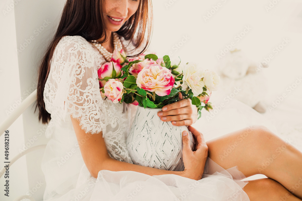 Cute beautiful girl in the style of bohemian, boho, hippie in the apartment on the bed. Modern vintage style, accessories, details Cute beautiful girl in the style of bohemian, boho, hippie in the apartment on the bed. Modern vintage style, accessories, details